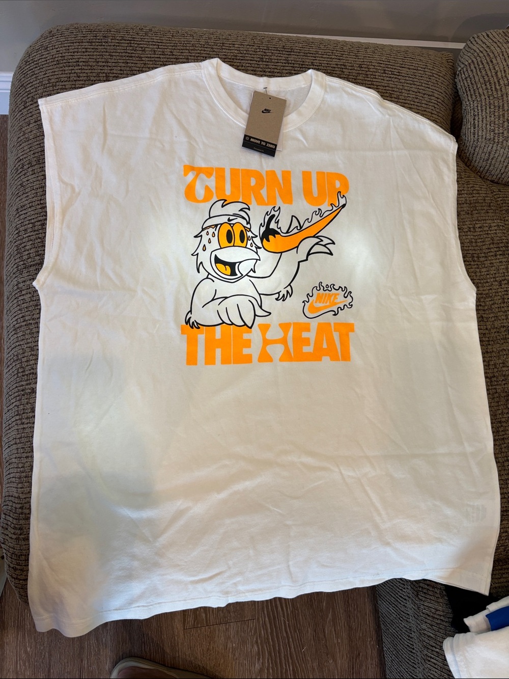 Nike White Kids Graphic Tank with Bright Orange 'Turn Up The Heat' Design